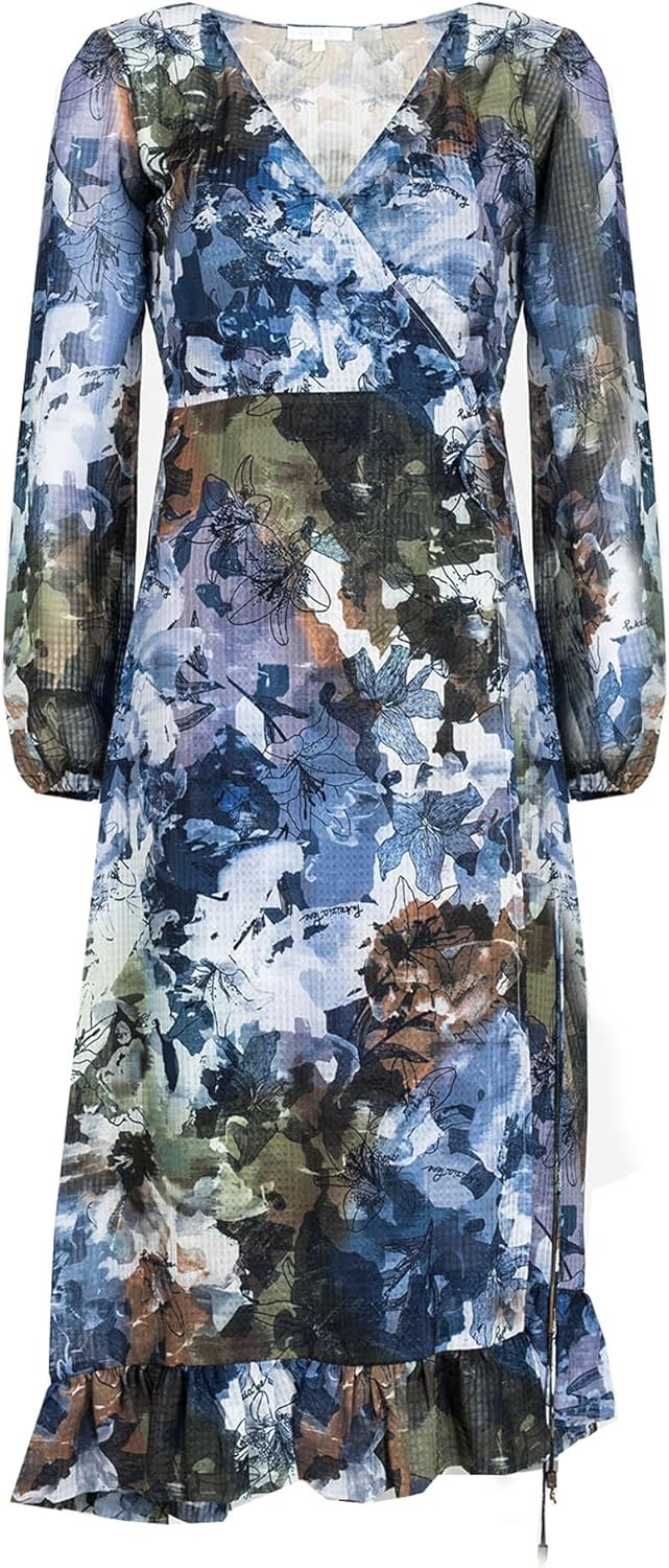 Pavo Monitor Arm mounted on a wooden desk with cables organized