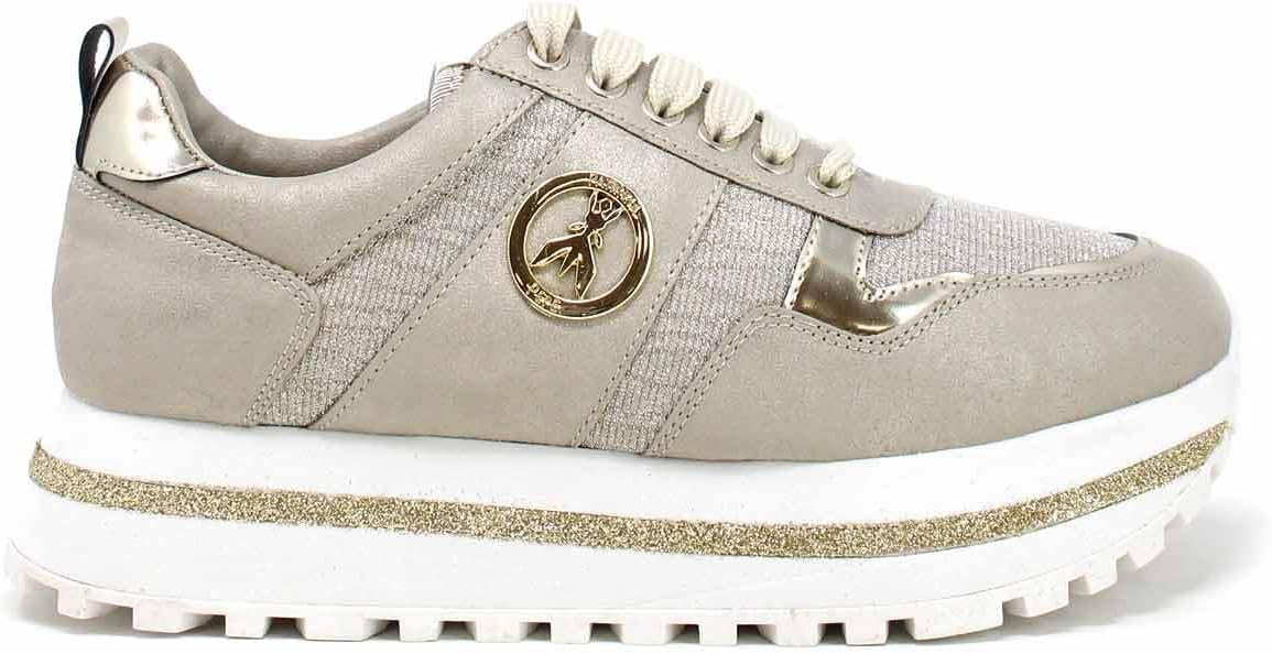 Pavo Monitor Arm installed on a wooden desk with monitor adjusted to eye level